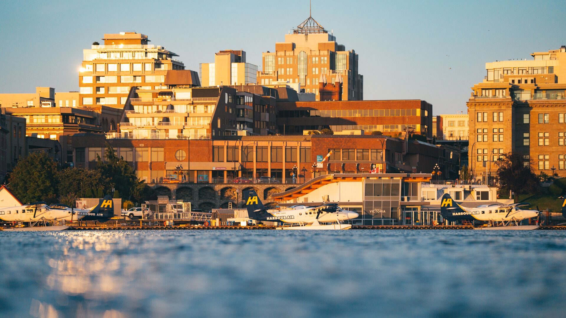 Golden evening light on the buildings of Victoria's waterfront