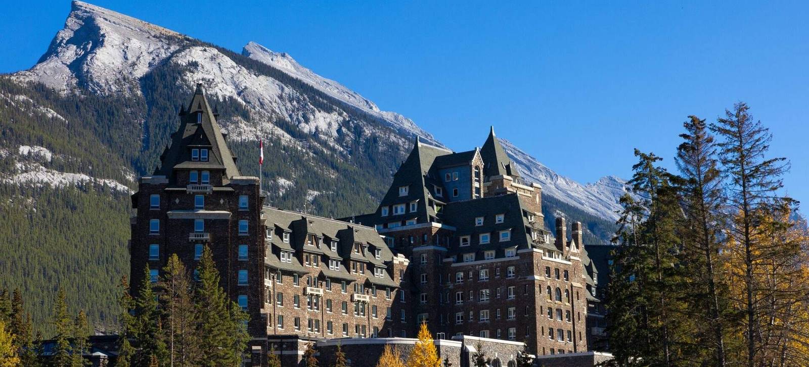 Fairmont Banff Springs below Mount Rundle on a clear autumn day