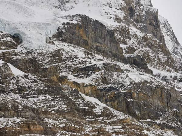 A rocky, snow-streaked mountain face near the Columbia Icefield